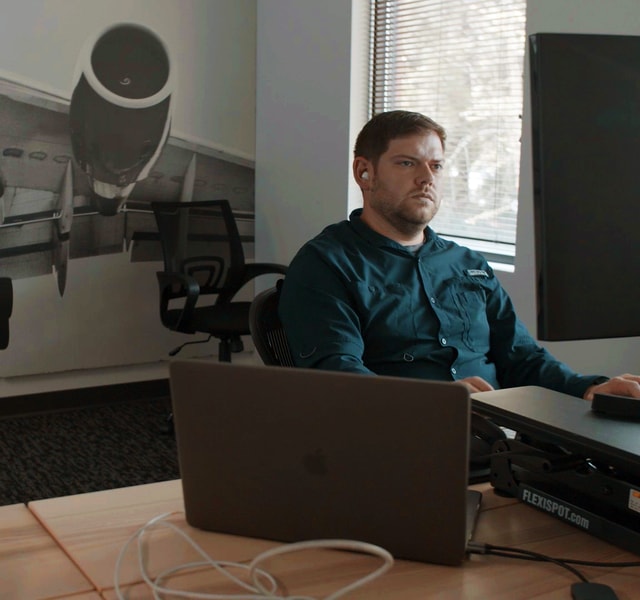 Software Engineer working near window