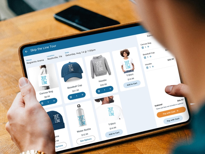 The Skip The Line point-of-sale app on a tablet, selling tour merchandise